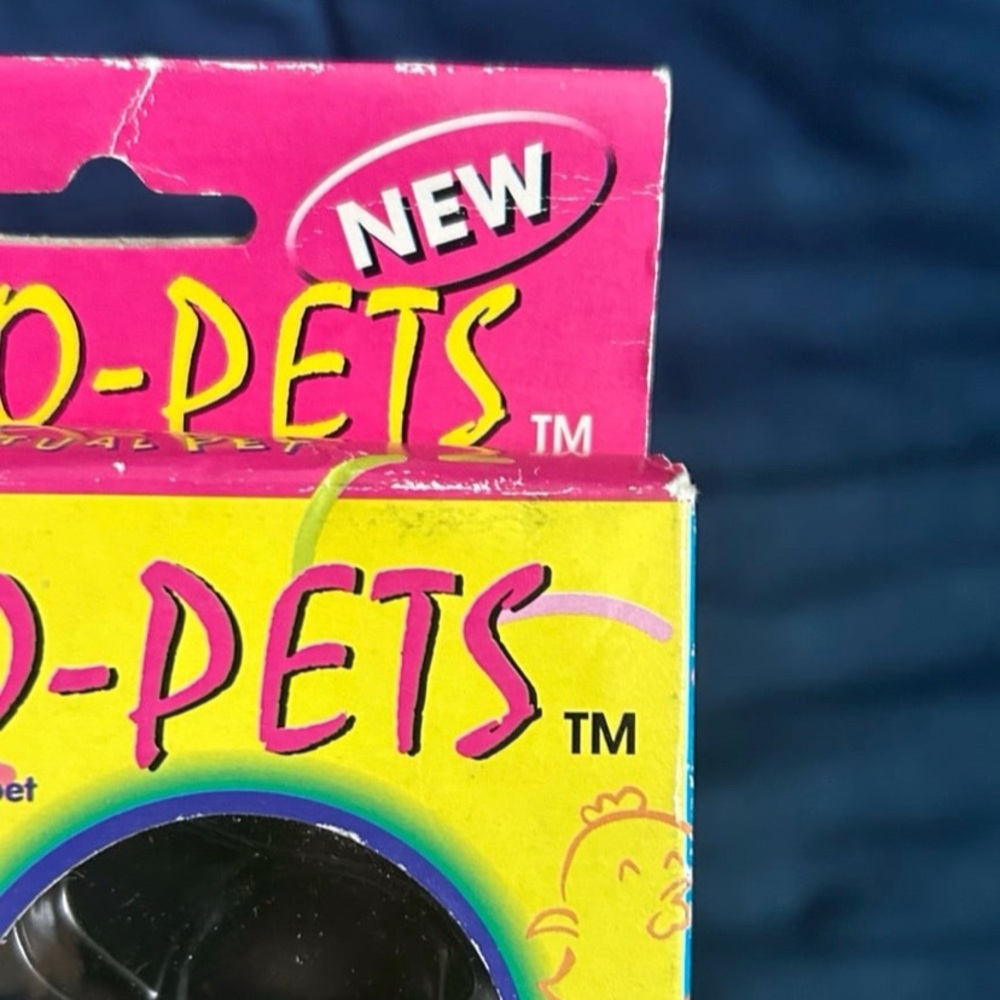 Octo-Pets 8 in 1 Virtual Pet Tamagotchi Style 1997 SEALED - Picture 5 of 12